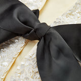 Textured Sequin Jacket with Velvet Bow Detail